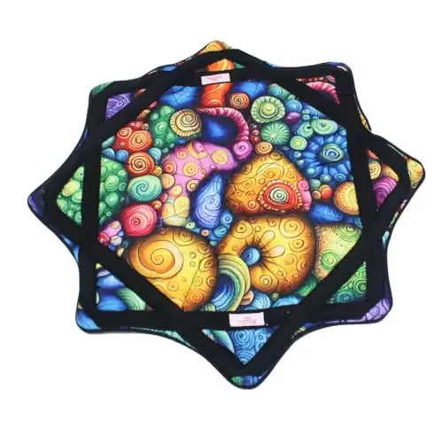 Colorful, abstract design potholder set with vibrant swirls and patterns on a black background.
