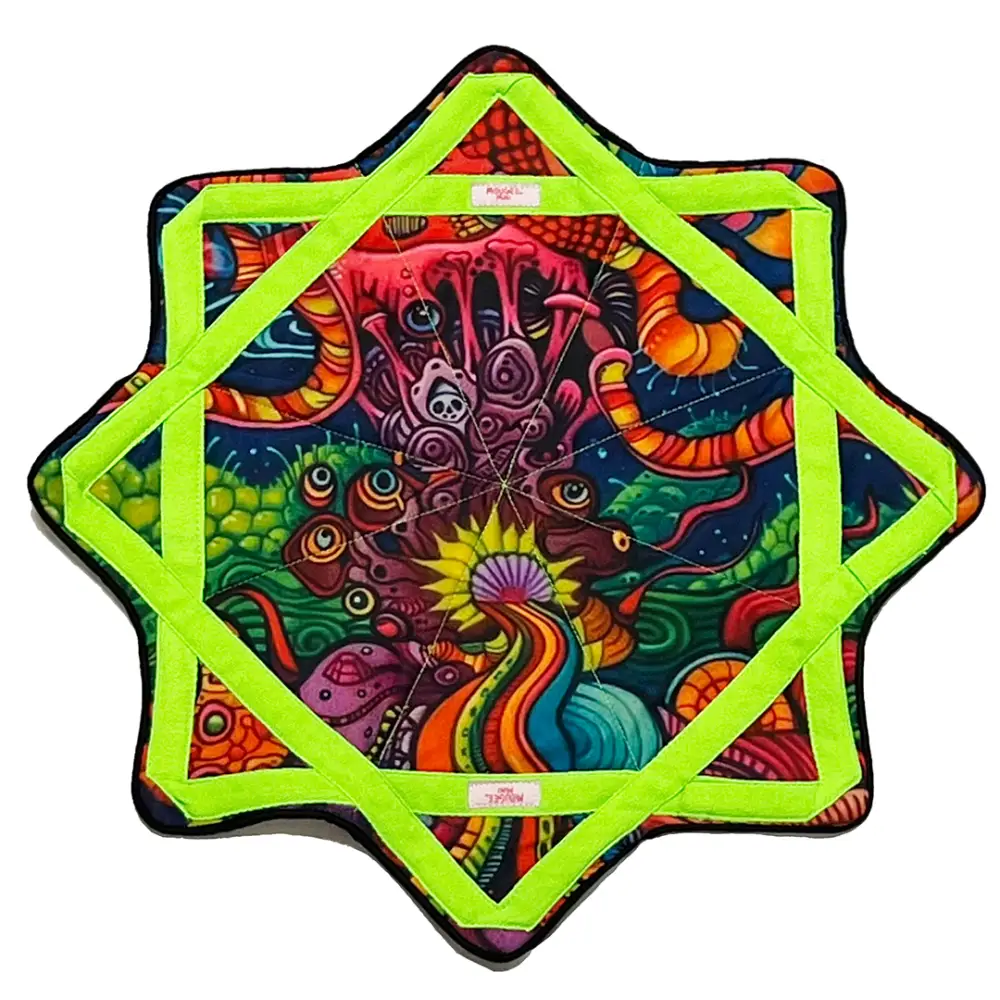 Neon green star-shaped puzzle mat with vibrant, psychedelic design featuring swirling patterns and bright colors.