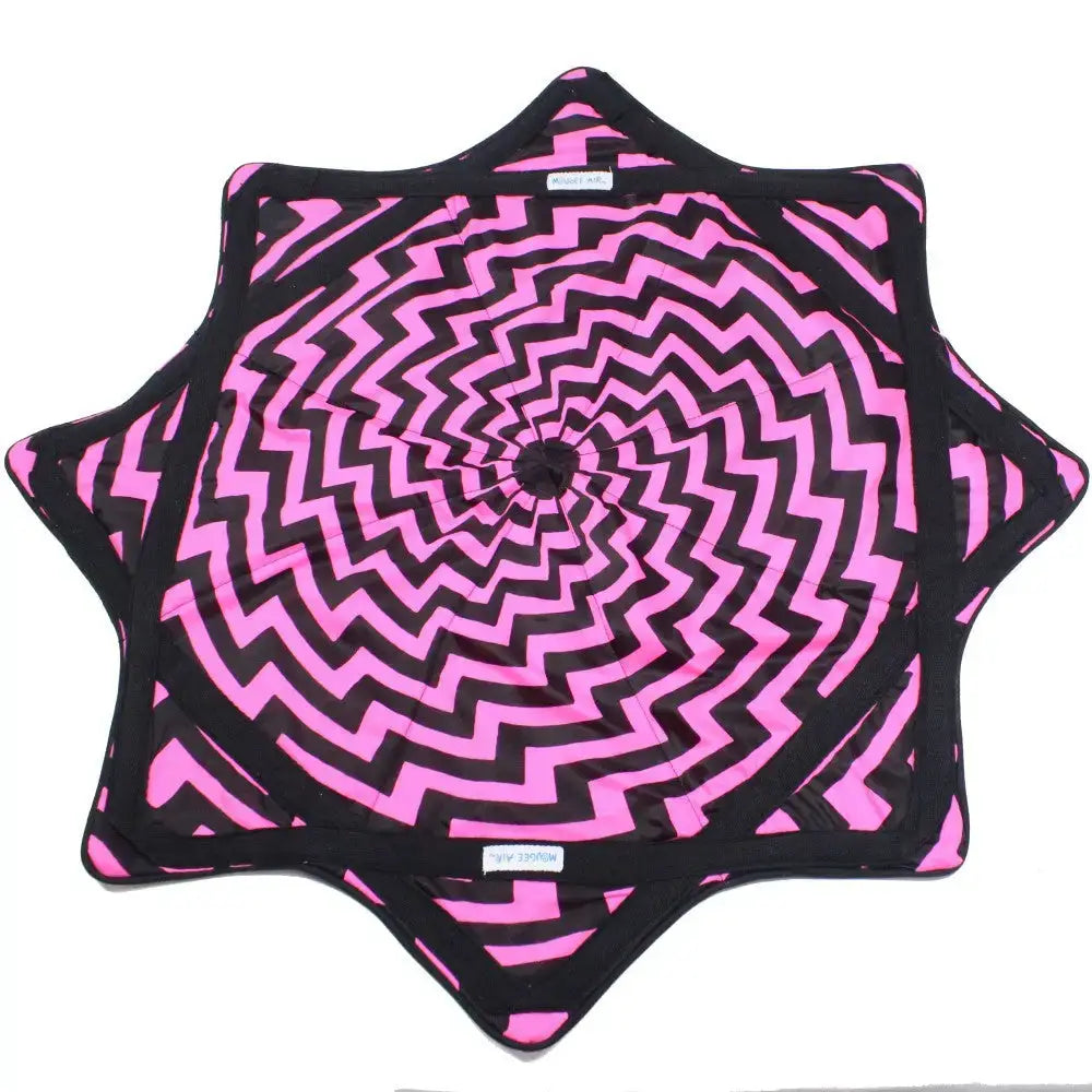 Pink and black chevron patterned yoga mat with a star-shaped design.