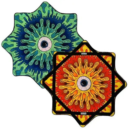 Hexagonal eye design coaster set with vibrant colors and black border.