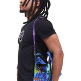 Blue and green psychedelic crossbody bag with purple strap
