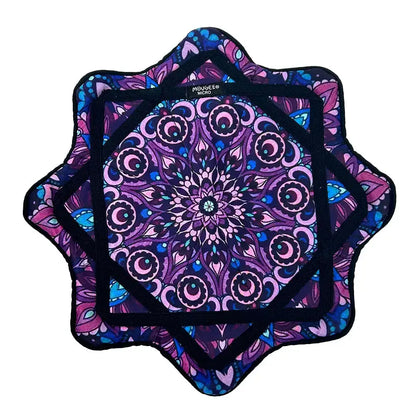 Purple mandala coaster set with black trim and intricate floral patterns.