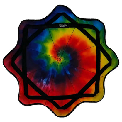Tie-dye star-shaped beach towel with vibrant rainbow colors and black trim.