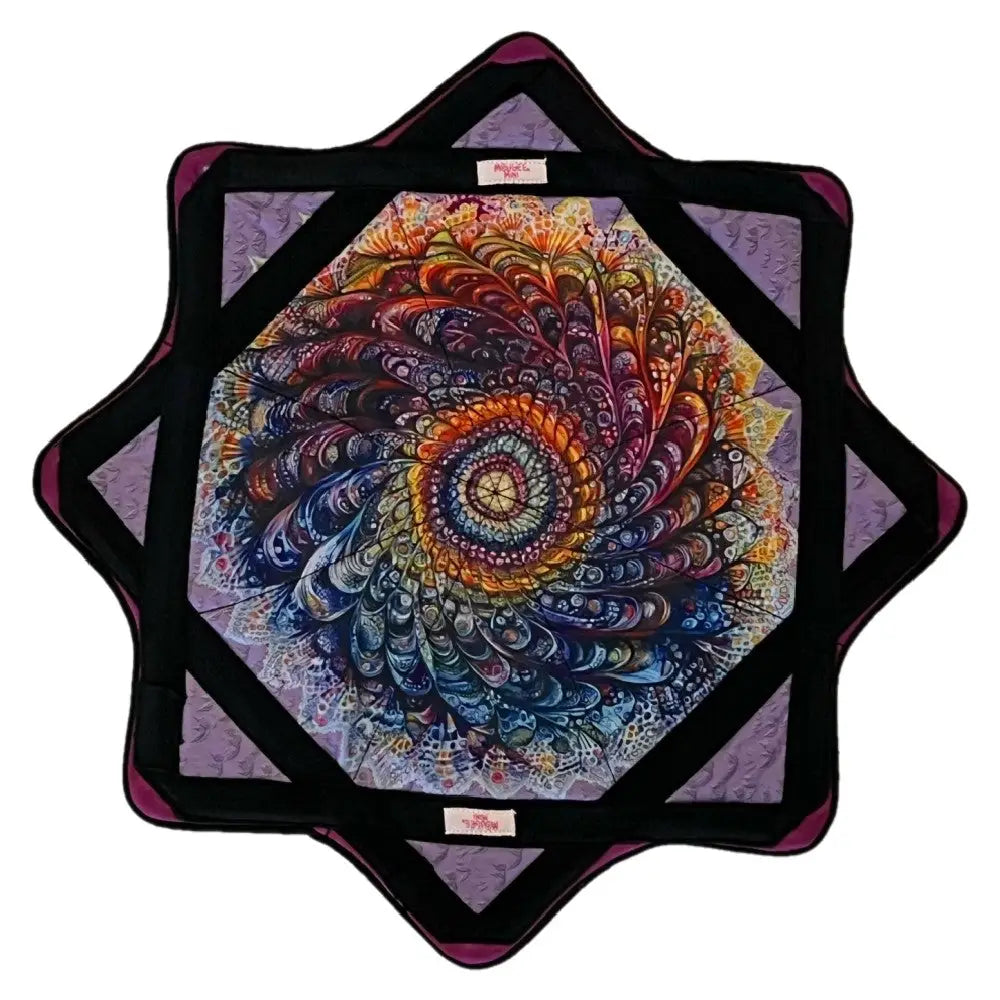 Star-shaped mandala tapestry with vibrant, multicolored patterns and a black border.