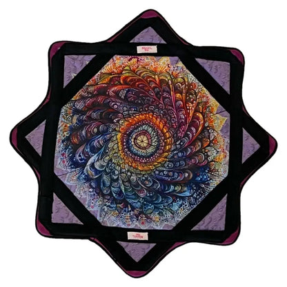 Star-shaped mandala tapestry with vibrant, multicolored patterns and a black border.