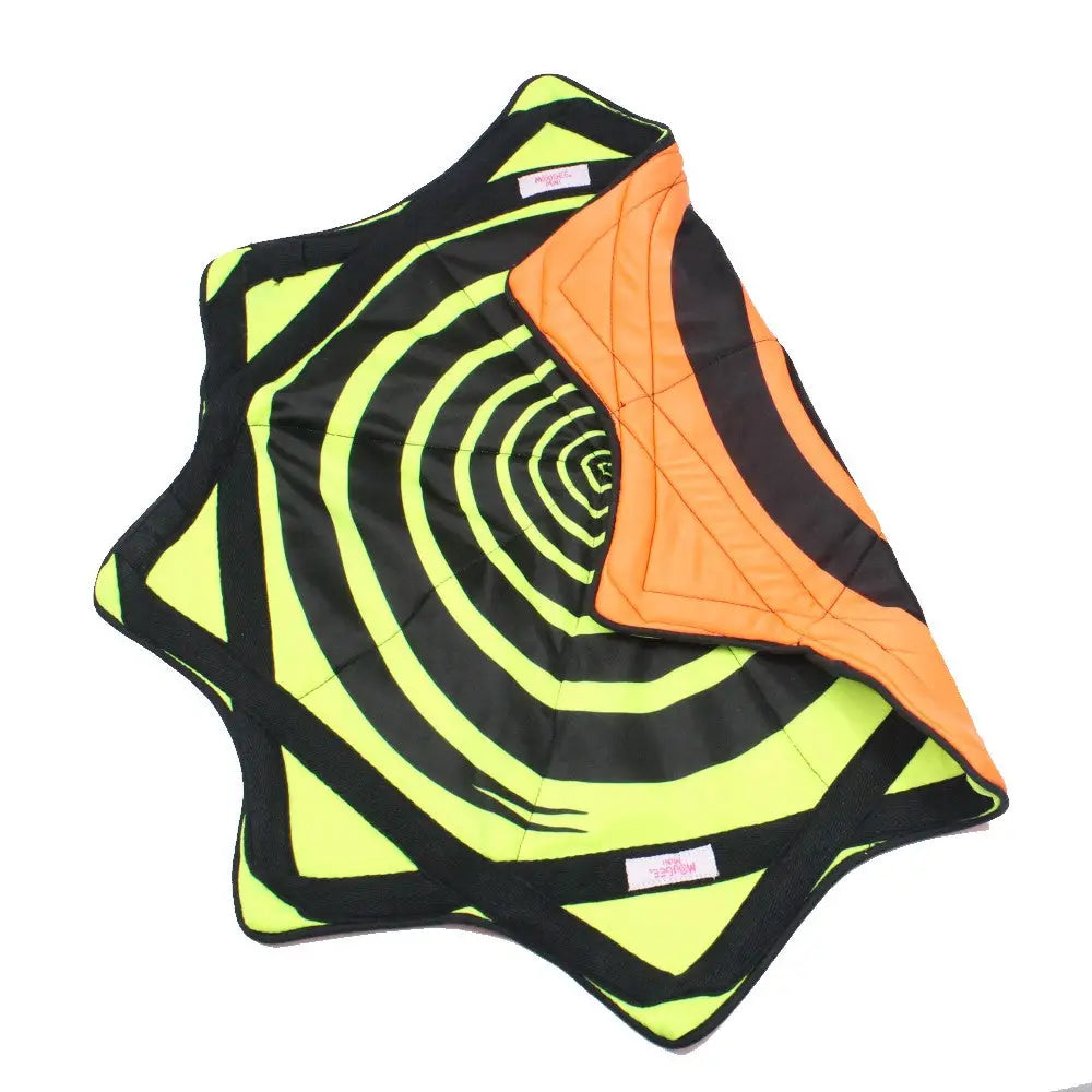 Neon spiral quilted blanket with black and orange accents.