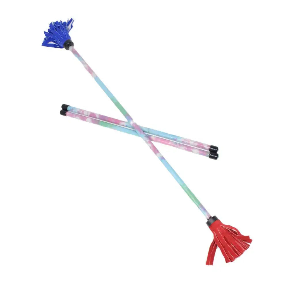 Rainbow-colored plastic toy sticks with tassels and pom-poms